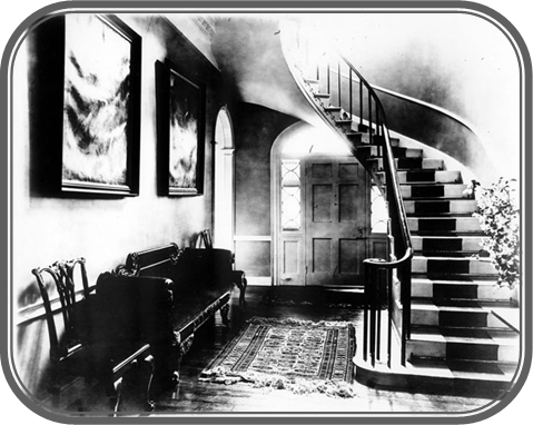 Cantilever Staircase at Ravensworth Note the American Chippendale chairs and Empire sofa in hallway